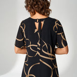 Edmée™ – Robe fluide graphique, élégance assumée