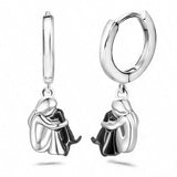 Ginny™ – Boucles d’oreilles icône chien (fermeture ronde)