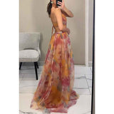 Amara | Robe Maxi Élégante en Chiffon Floral avec Décolleté Découpé
