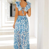 Amira | Robe Maxi Dos Nu à Motif Floral avec Volants et Découpes
