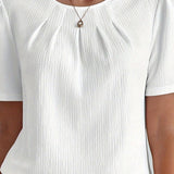 Noémie™ — T-shirt élégant à texture subtile